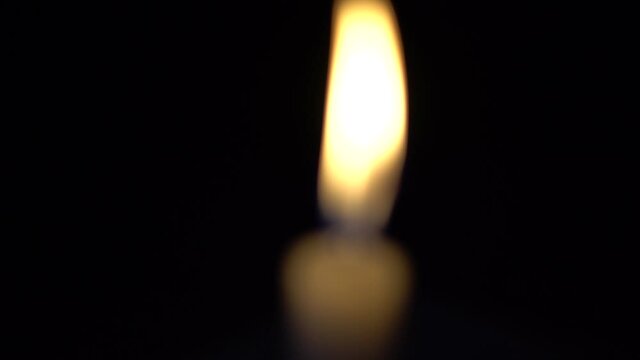 The burning candle lights up the night.
