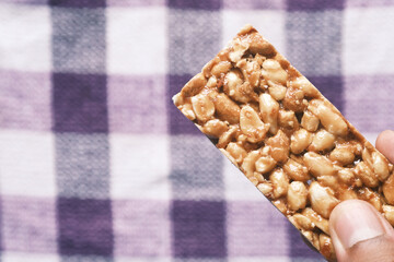 pea nuts sweet bar on a plate close up 
