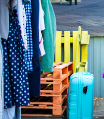 display of second hand clothes on rack for charity,donation,reusing or reselling for second life...