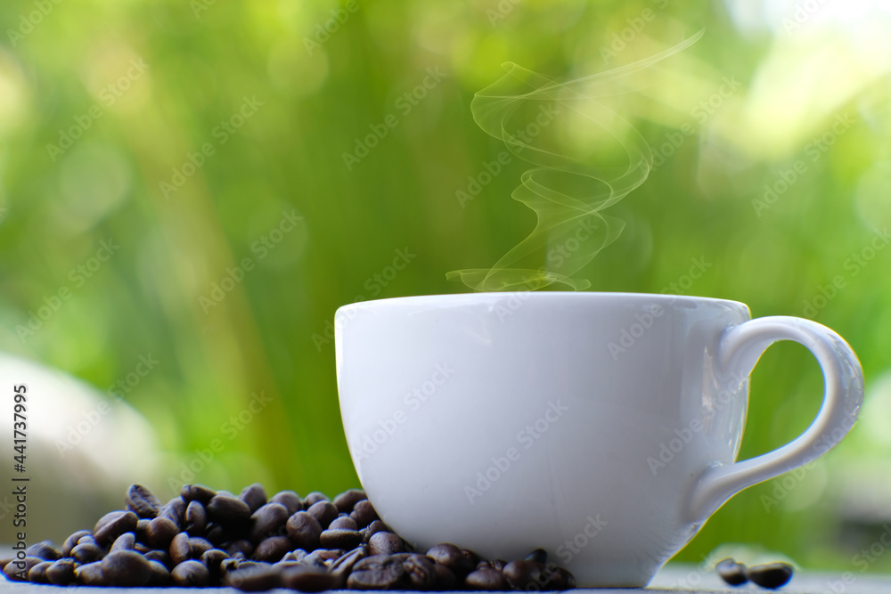 Canvas Prints Coffee cup and coffee beans on table, americano coffee in coffee shop, copy space for text, close up white cup on counter