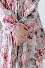 Stylish dress with a pattern of flowers Clothes for a little girl