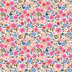Cute floral pattern. Seamless vector pattern. Elegant template for fashion prints. Small pink and blue flowers for folk print. White background. Stock vector.