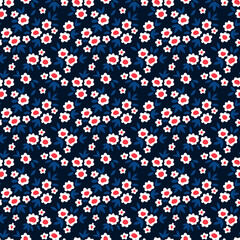 Vintage floral background. Floral pattern with small white flowers on a dark blue background. Seamless pattern for design and fashion prints. Ditsy style. Stock vector illustration.