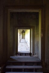 Fototapeta na wymiar Old temple doorway and corridor with steps