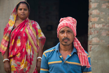 Portrait of a Rural Couple Standing in Front