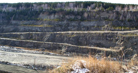 Graphite quarry. Open pit mining of graphite