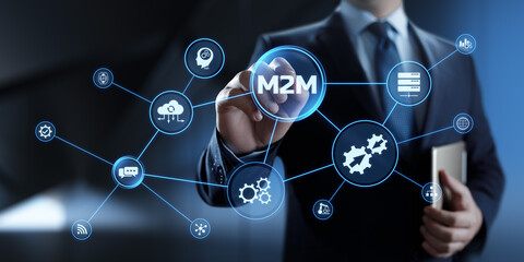M2M Machine to machine industrial technology concept. Businessman pressing button.