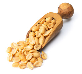 roasted peeled peanuts in the wooden scoop, isolated on white background