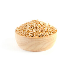 Dry organic wheat seed pile in wooden bowl on white background, for carbohydrate food ingredient or agricultural product concept