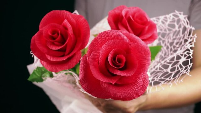 man give red rose flower to girlfriend in anniversary, love inspiration of red roses flower.