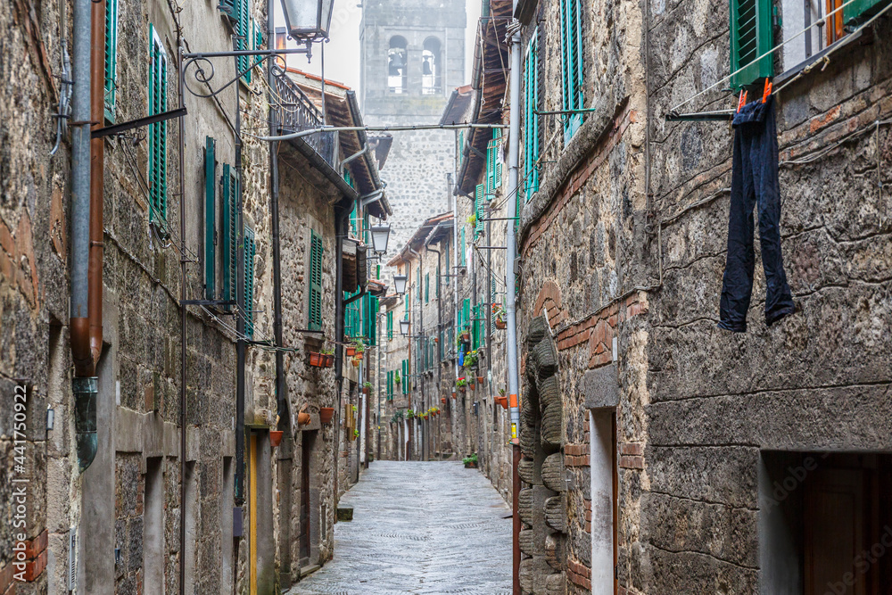 Wall mural City Alley in an Italian small town