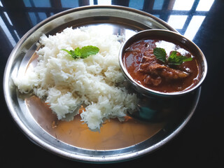 chettinad mutton gravy with white rice