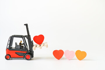 Love Concept of Red Heart Sign loading carry on Forklift Truck, Lovely Heart, A Perfect Gift or Present for Someone Special, Valentines Day background - Powered by Adobe
