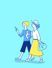 笑顔で歩く2人の女性