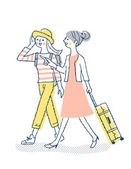 笑顔で歩く2人の女性