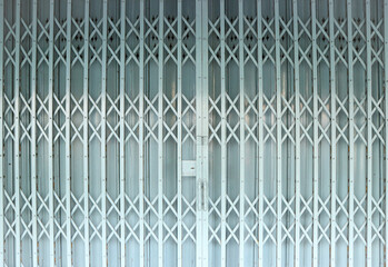 steel stretch door traditional old style sliding gate, formed by galvanized metal long bars and...