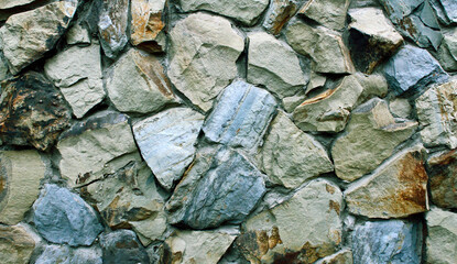 Background from large stones in the wall. Abstract stone background