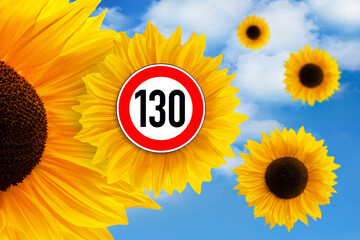 Sonnenblumen und Schild Tempolimit Geschwindigkeit 130