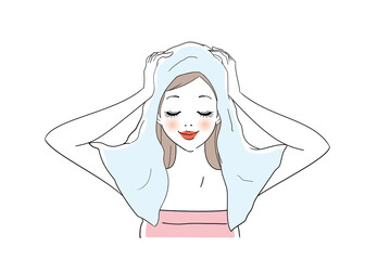髪をタオルで拭く女性