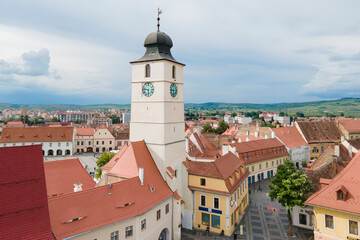 Fototapeta premium Aerial view of ancient part of Sibiu in Romania, red roofs town in summer day
