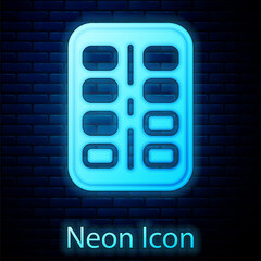 Glowing neon Nicotine gum in blister pack icon isolated on brick wall background. Helps calm cravings and reduces anxiety caused by quitting smoking. Vector