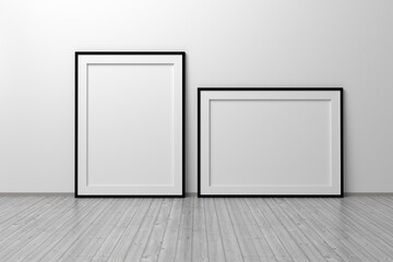 Mockup template of two vertical and horizontal A4 frame with thin black frame border standing next to wall on wooden floor