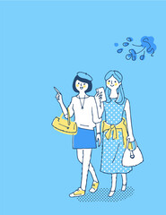 笑顔で歩く2人の女性