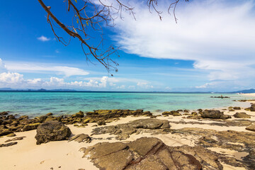 Beautiful white sand beach with blue sky and turquoise sea of Bamboo island or Koh Mai Pai. Phi Phi...