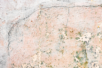 Texture of a concrete wall with cracks and scratches which can be used as a background