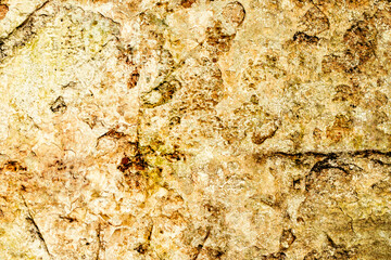 Texture of a concrete wall with cracks and scratches which can be used as a background