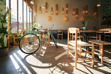 Interior of modern cafe with wooden furniture