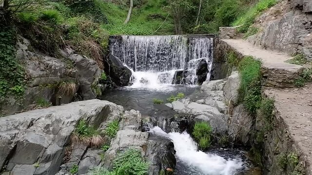Beautiful waterfall on the Arrago river in the town of Robledillo de Gata, Spain