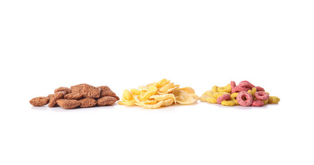 Heaps of different cereals on white background