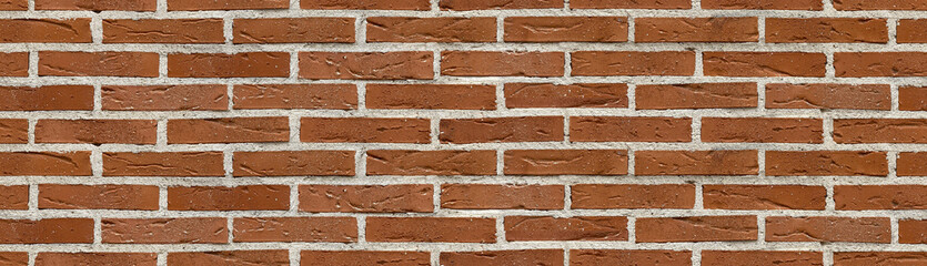 Brick red wall. background of a old brick house. Seamless texture. Perfect tiled on all sides.