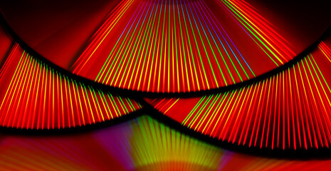 red led light rays reflection on cd surface