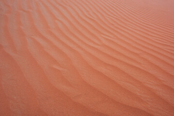 Fototapeta na wymiar desert sand dunes and sand pattern . Desert sand mountain.
