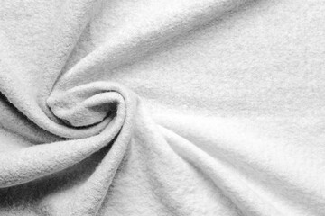 Texture of grey fluffy fabric, closeup