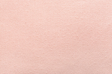 Texture of pink canvas fabric, closeup