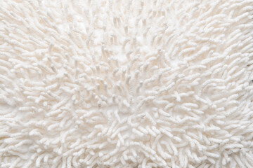 Texture of white fluffy fabric, closeup