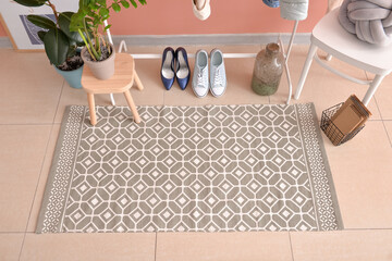 Stylish rug in interior of modern hallway