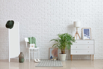 Interior of stylish hallway with rug
