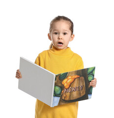 Shocked little girl with book on white background