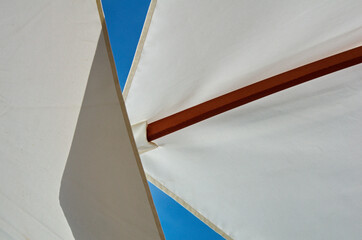 Low Angle View Of White Umbrella Against Sky