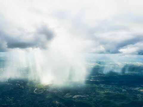 Aerial view of shower rain falling to earth surface , calm and meditaion concept