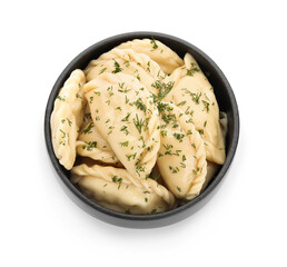 Bowl with tasty dumplings on white background