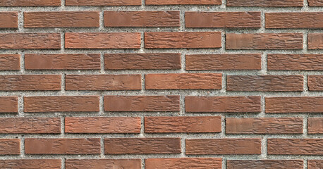Obraz premium Brick red wall. background of a old brick house. Seamless texture. Perfect tiled on all sides.