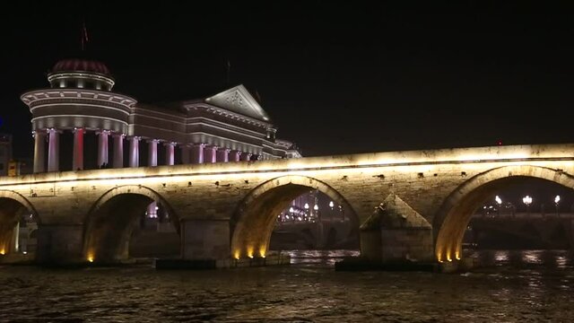 Stone Bridge, behind the Archeology Museum at night in Skopje, Macedonia. Stone Bridge is considered a symbol of Skopje.
