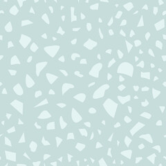 Stone fragments of turquoise color. Terrazzo flooring seamless pattern. Abstract textured background with broken small tile chips. Vector illustration.