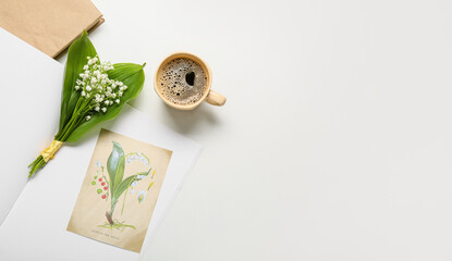 Fototapeta na wymiar Beautiful lily-of-the-valley flowers, cup of coffee and greeting card on light background