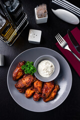 american buffalo wings with sauce, a traditional American snack